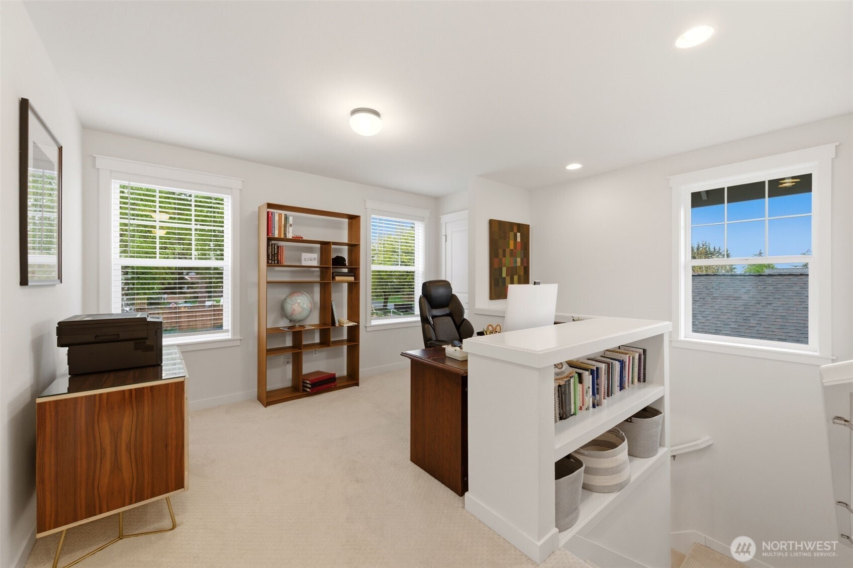 Upstairs bonus space perfect for an office, play area, or TV room.