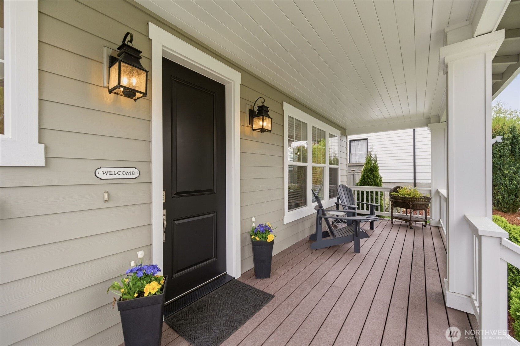 Welcome your guests on this beautiful front porch