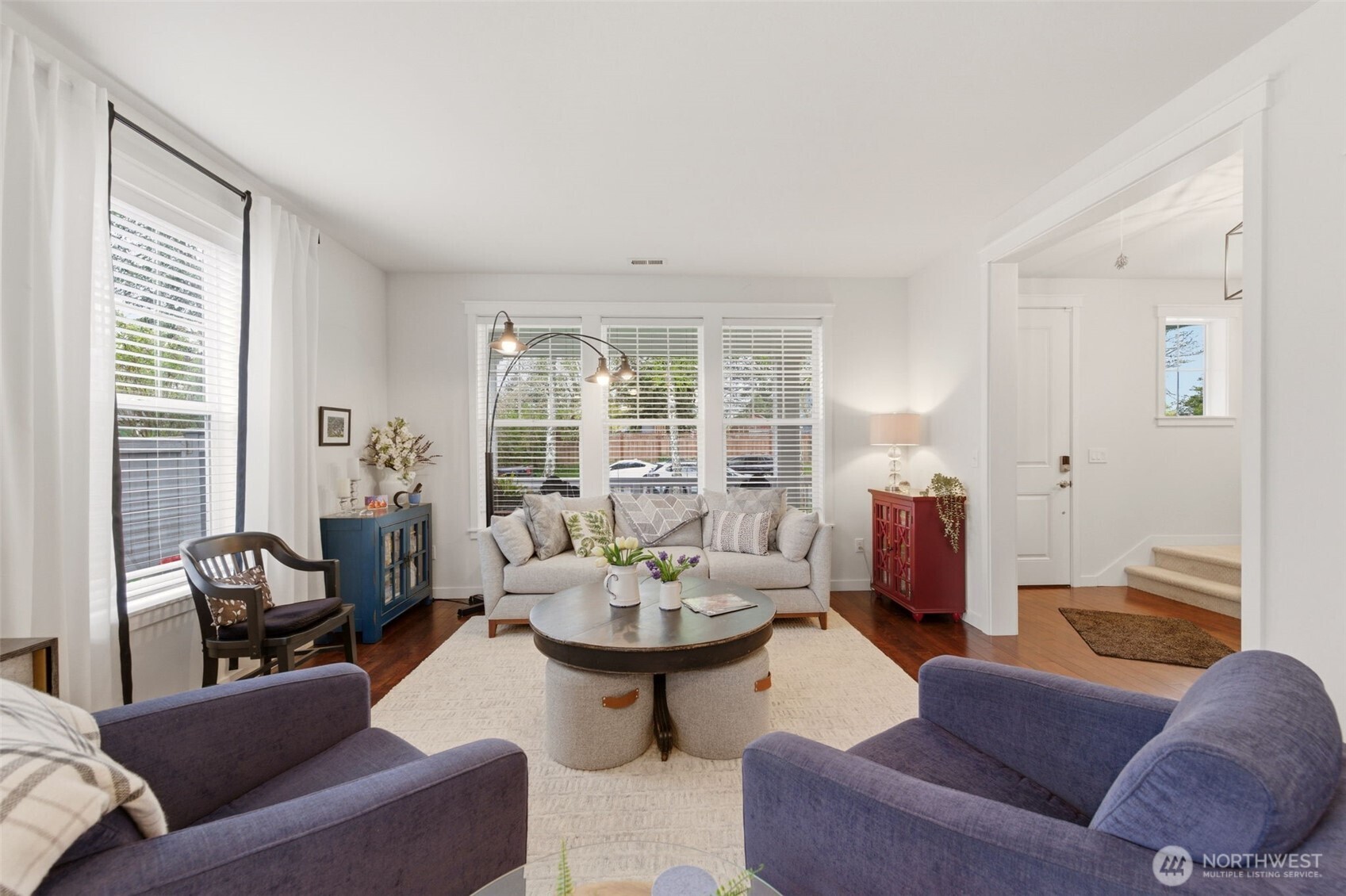 Living space is welcoming with soft natural light. Perfect for relaxing and entertaining.