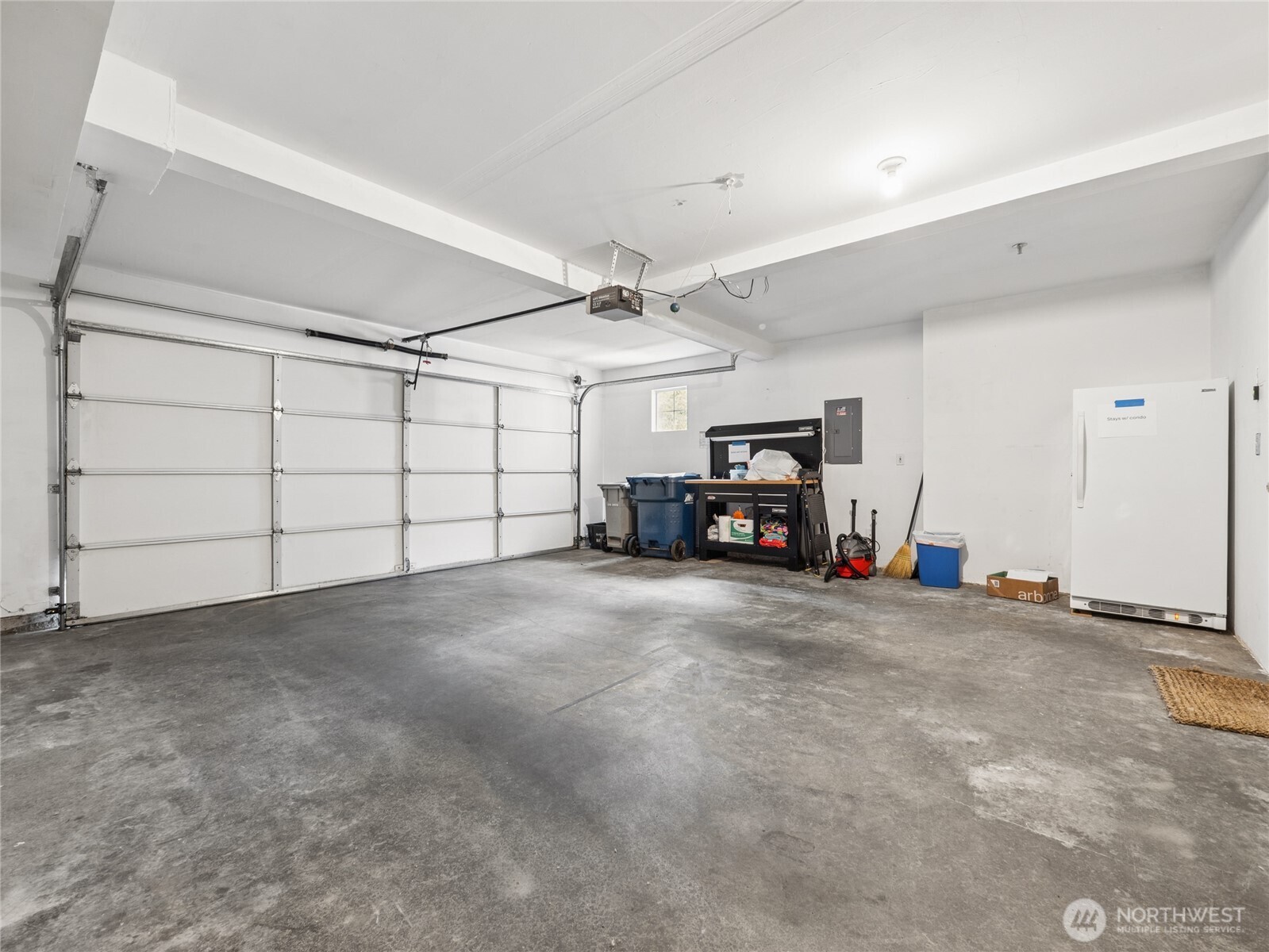 Oversized two car garage -- includes freezer!
