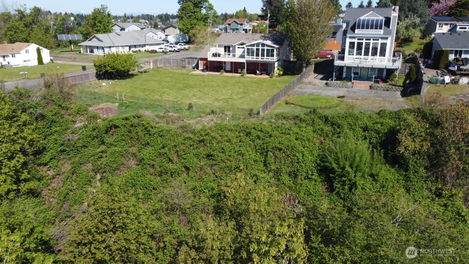 Endless Possibilities or Just leave As Is....You can move your back fence and clear the brush if you choose