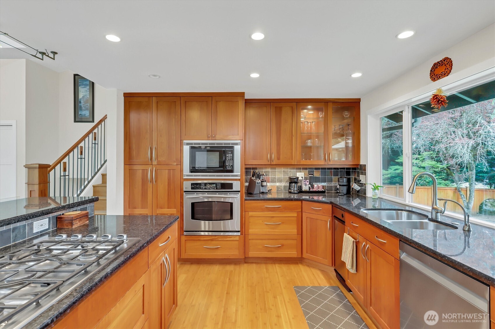Stainless appliances and gas cooktop.
