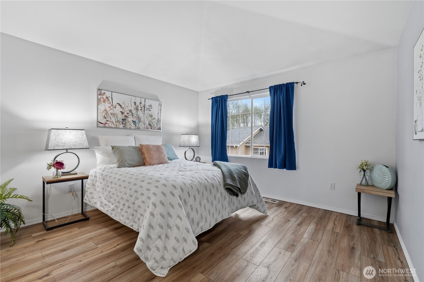 Primary bedroom with ensuite bath and walk-in closet
