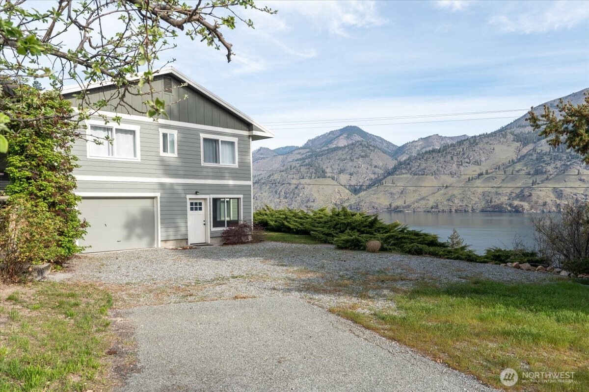 Driveway to tandem 2-car garage