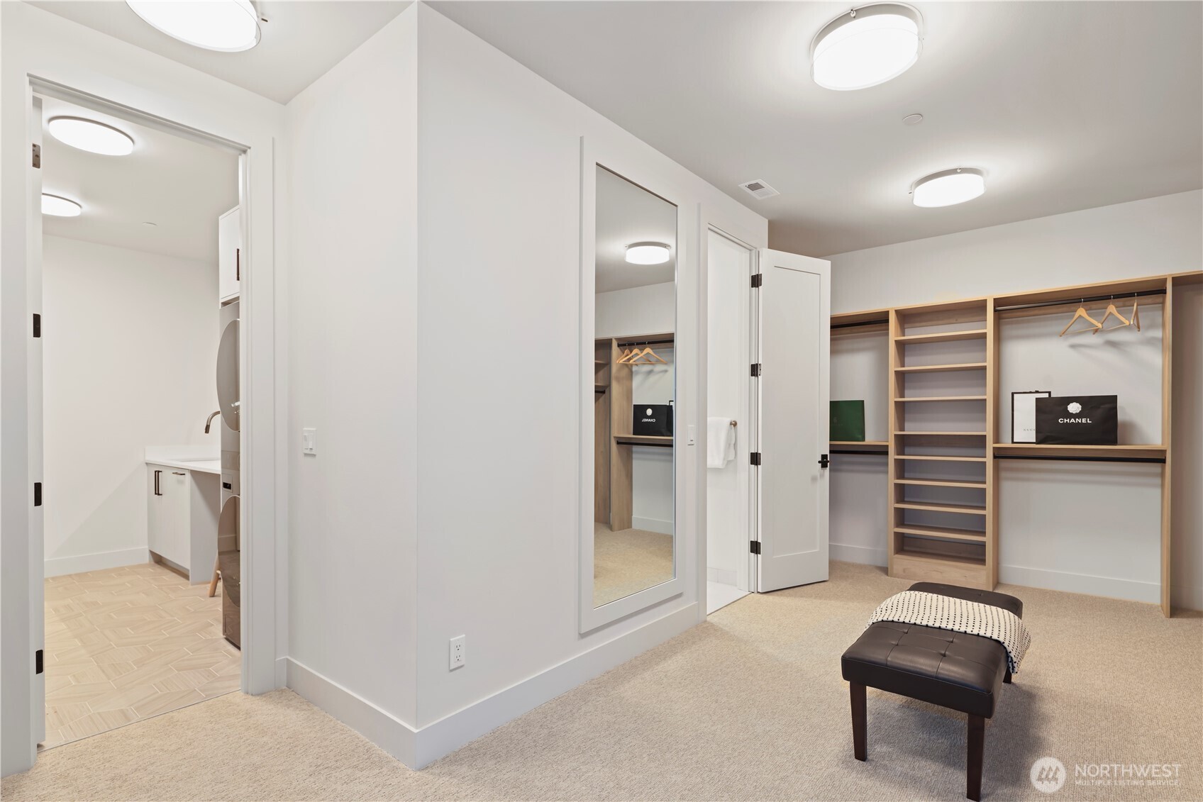 Primary closet wraps around to the laundry room.