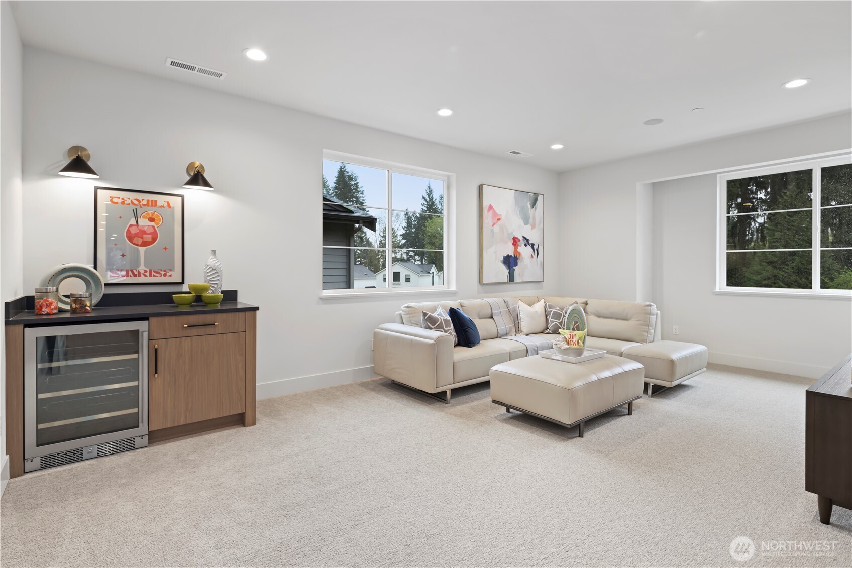 Bonus room with snack bar and beverage center and prewired for speakers.