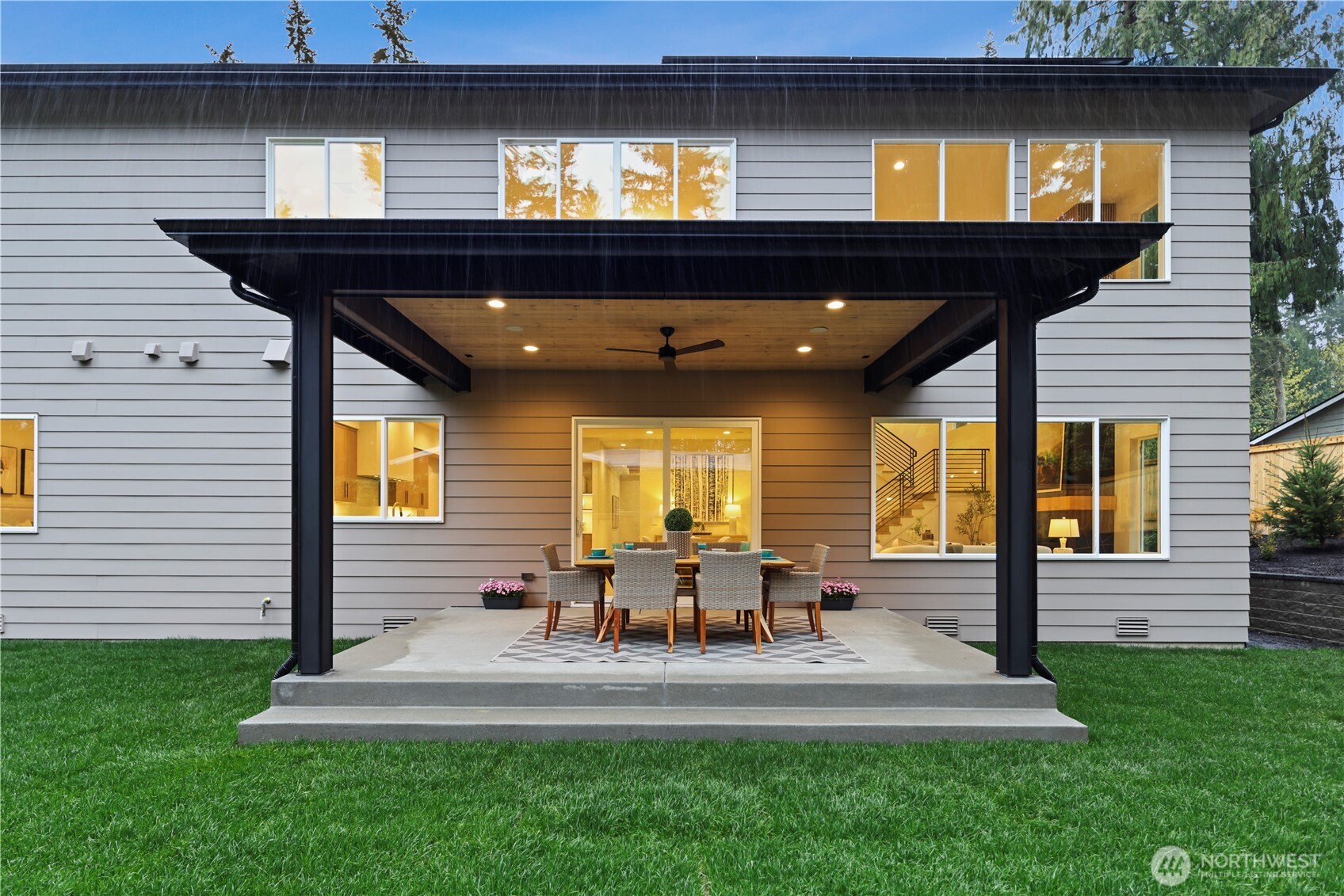 Wide sliding glass door leads to the large covered outdoor patio. Ceiling fan, prewired for sound, dedicated gas BBQ line as well as a gas line that can be sued for a fire table. Prewired for ceiling heaters.