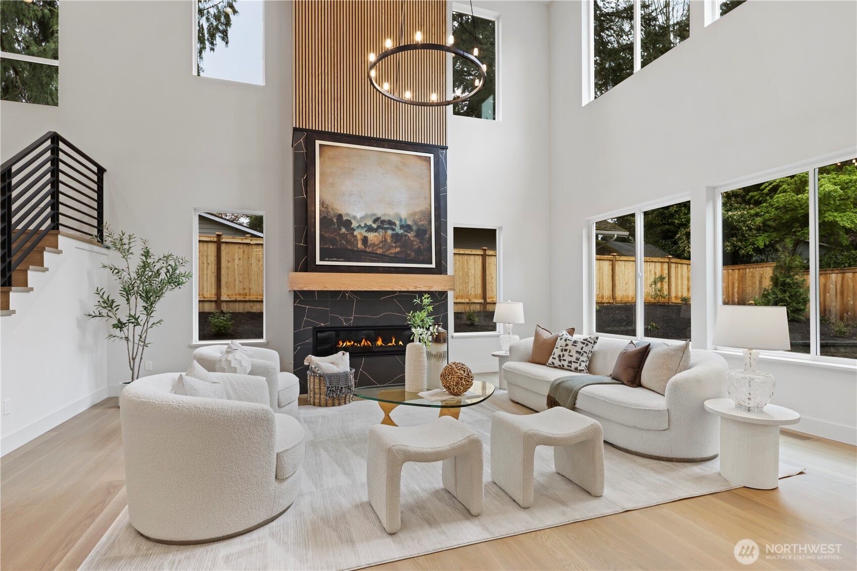 Large office with coved ceiling and lovely view out to the Evergreens in the distance.