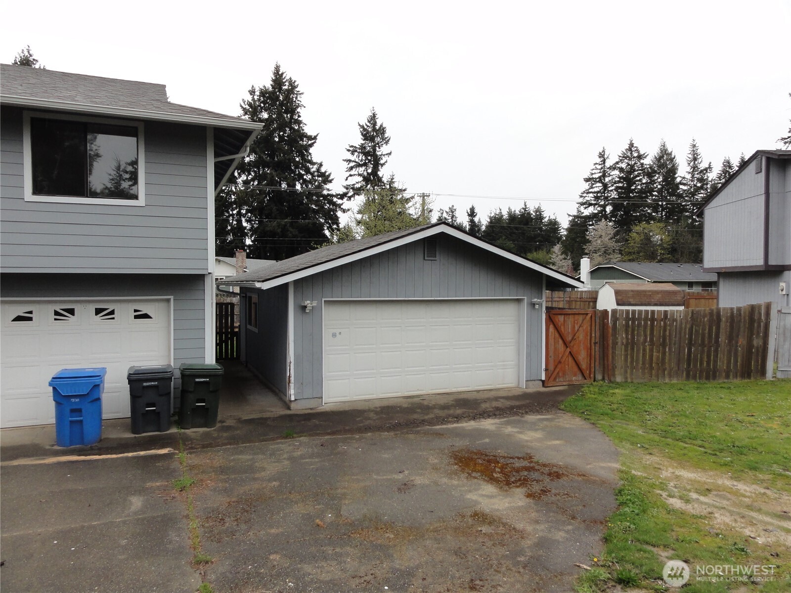 Bonus is a detached garage with shop.