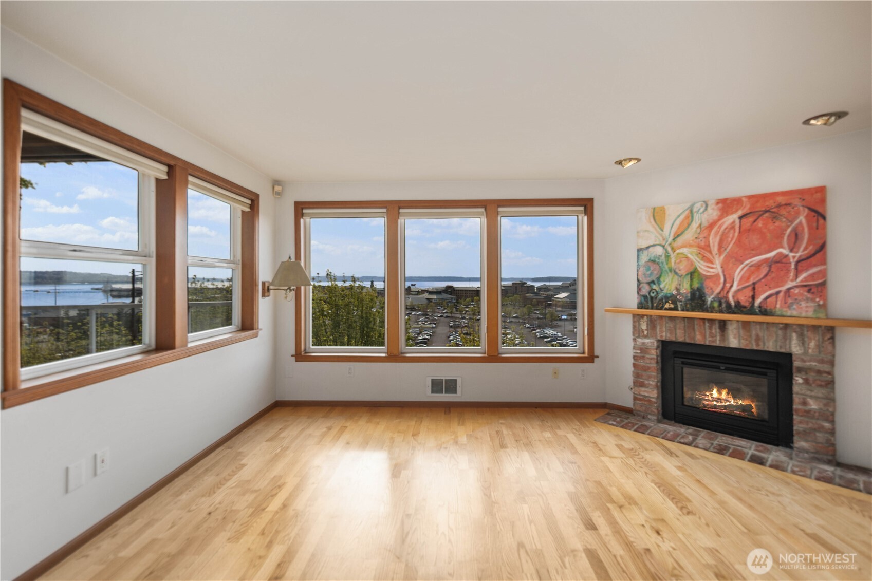 main living room with fireplace and views!