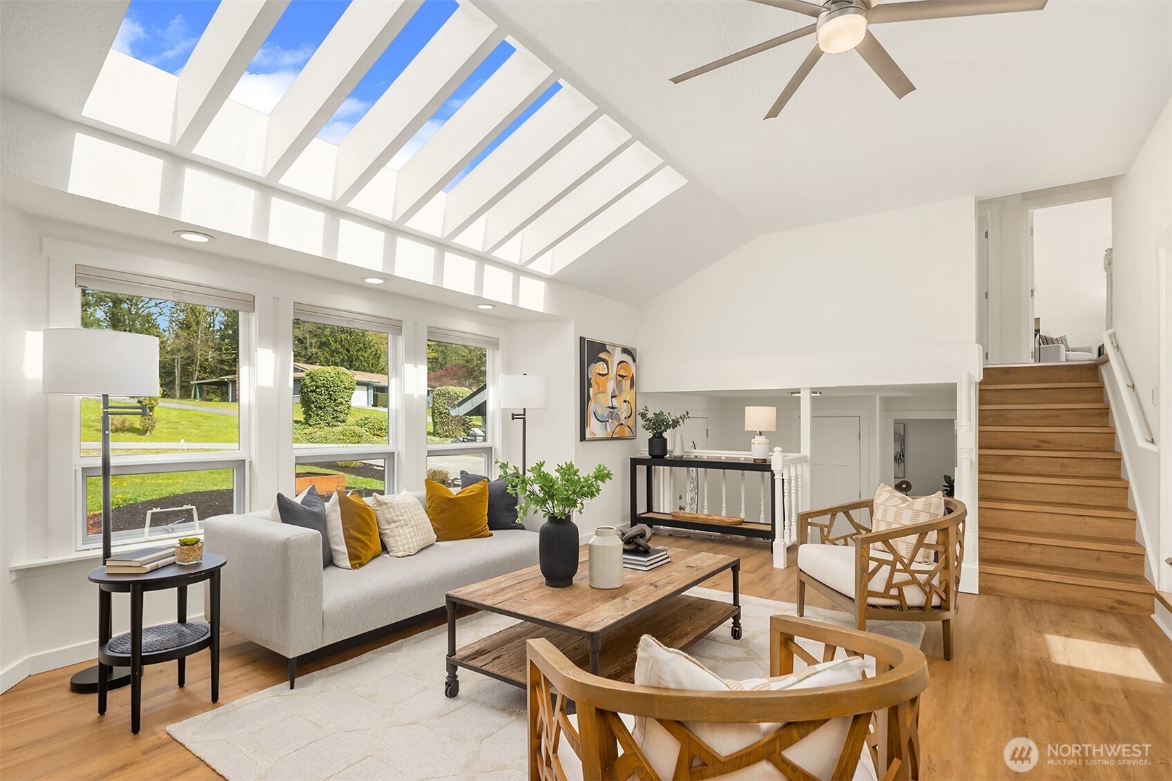 Formal living room right off open kitchen and dining room.