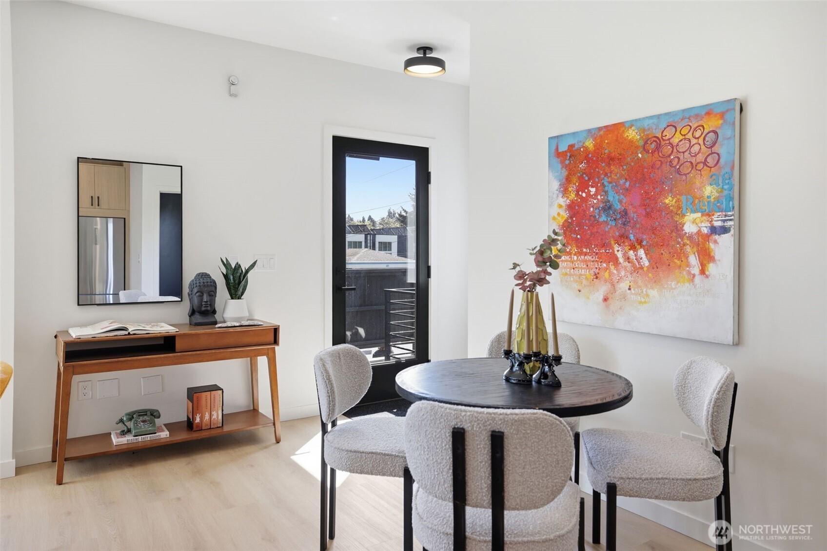 Well lit main level living, custom lighting throughout.