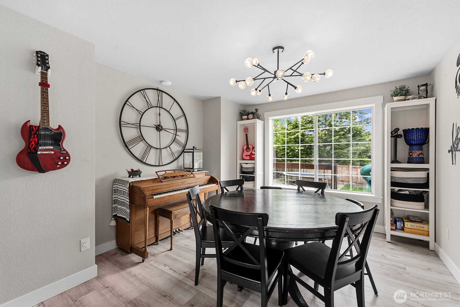 Over sized window in dining room looking to the backyard.