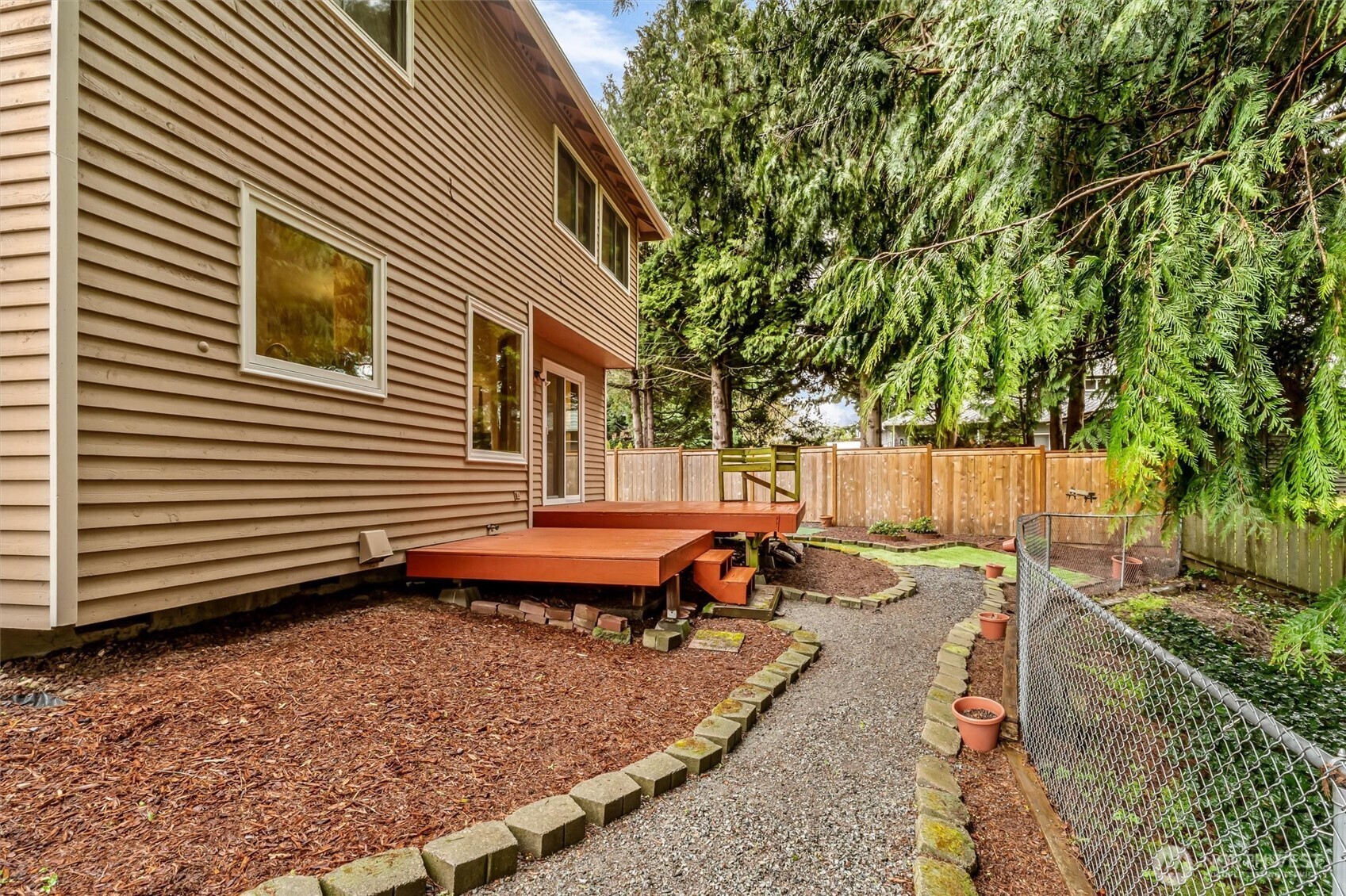 Home backs up to green space.