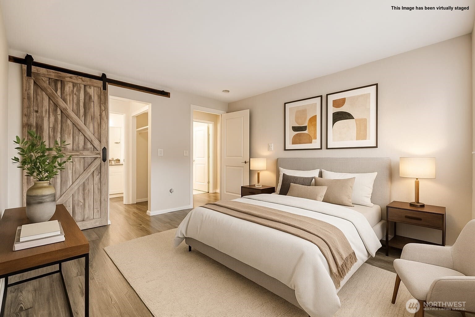 Primary bedroom with entrance to walk in closet and bathroom