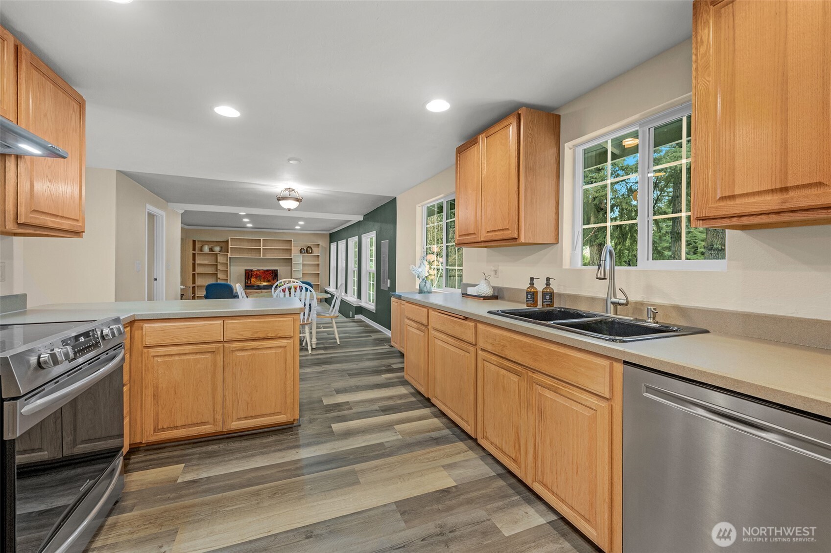 Bright, spacious kitchen with LVP floors. All appliances are included.