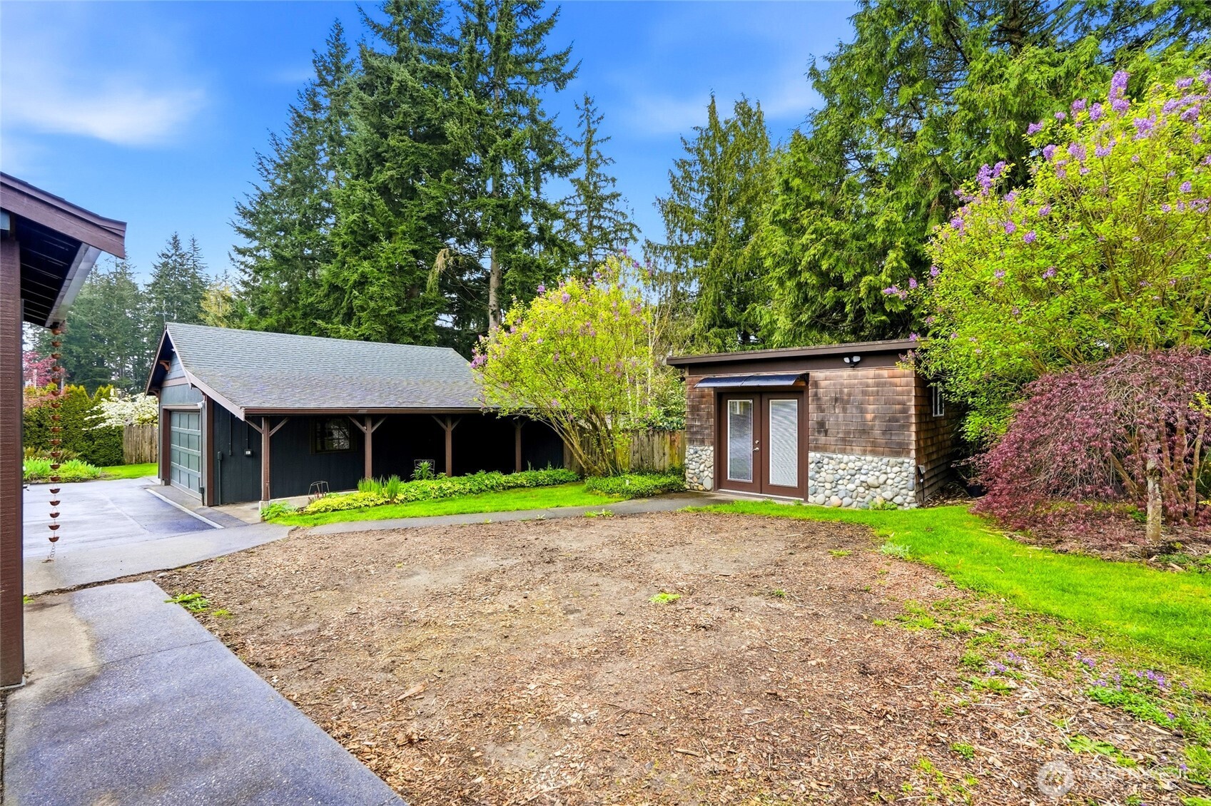 The property includes a heated studio—ideal for rental income, home office, or guest space