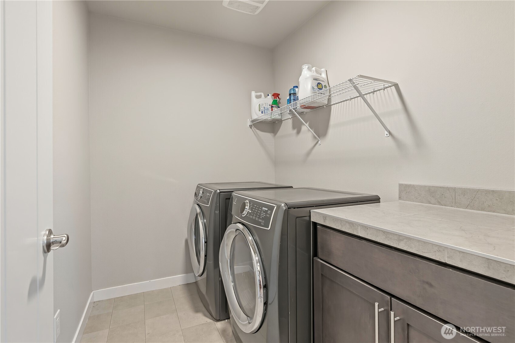 Laundry w/Folding Space Located on 2nd Floor Near All Bedrooms