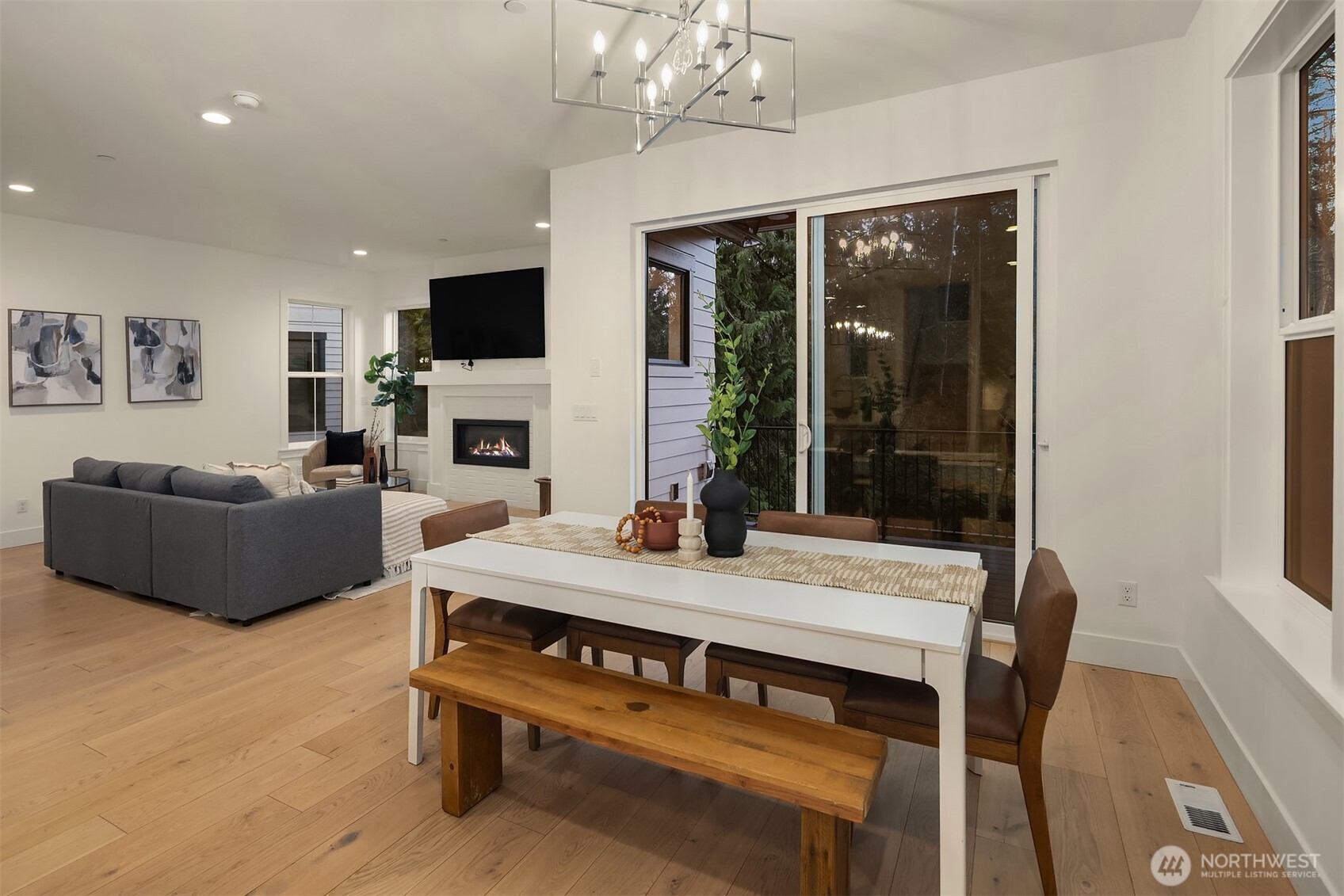 Large slider door steps out to the deck extending your entertainment space to the outdoors.