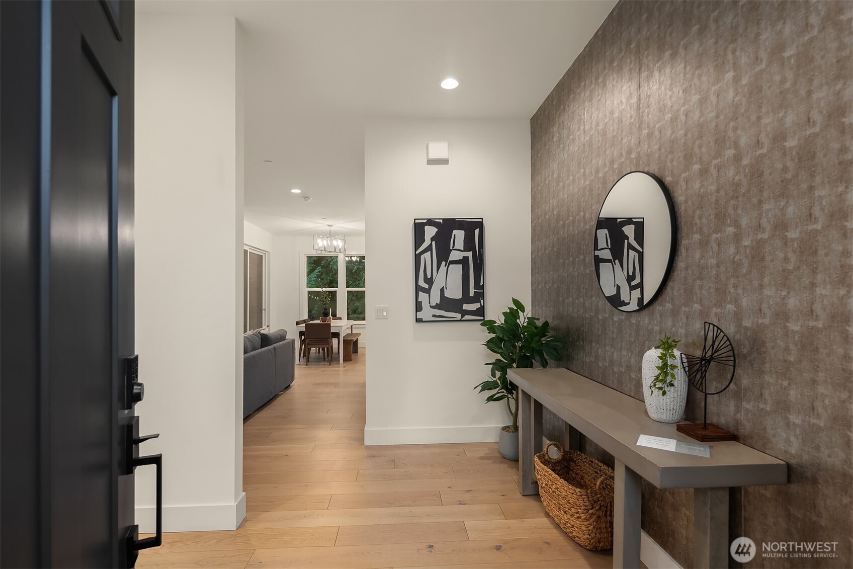 Upon entering the home, you'll be greeted by a lovely floor plan where modern design blends with refined style.