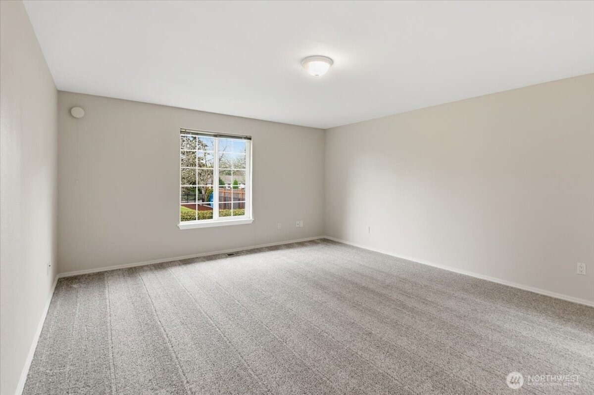 Primary Suite with walk-in closet and bathroom