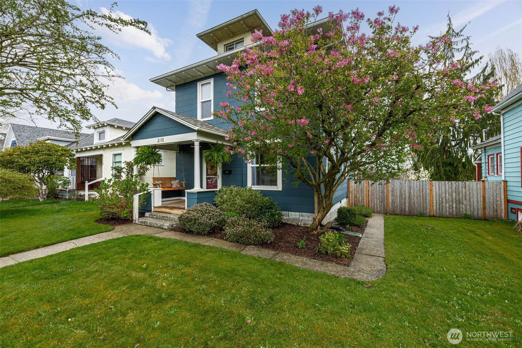 Storybook curb appeal with space to grow + room to breathe.