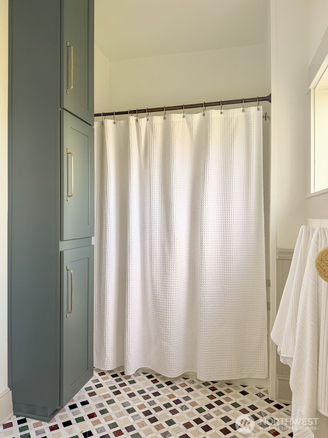 Thoughtfully UPDATED space with charming tile details.