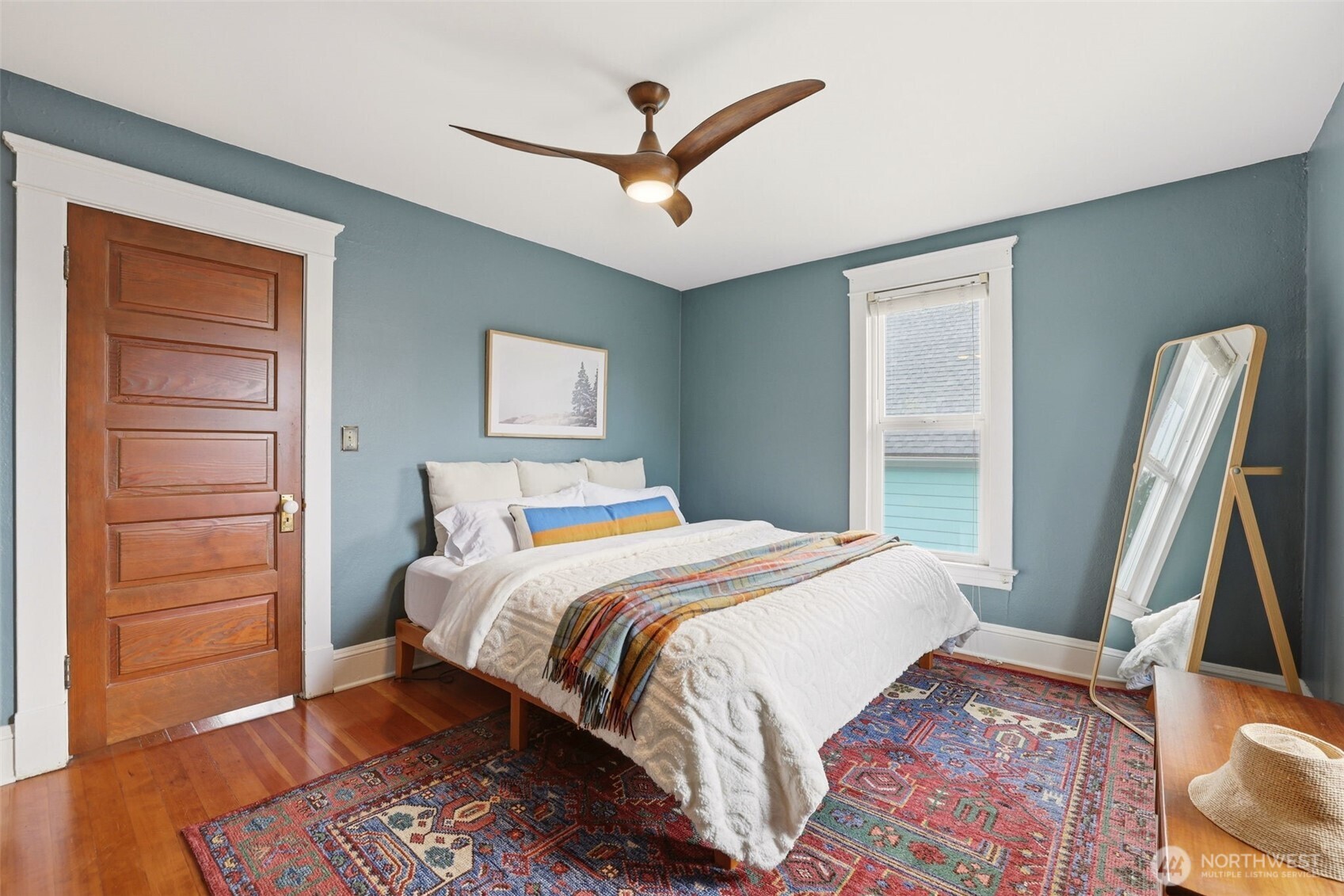 Large + bright bedroom.