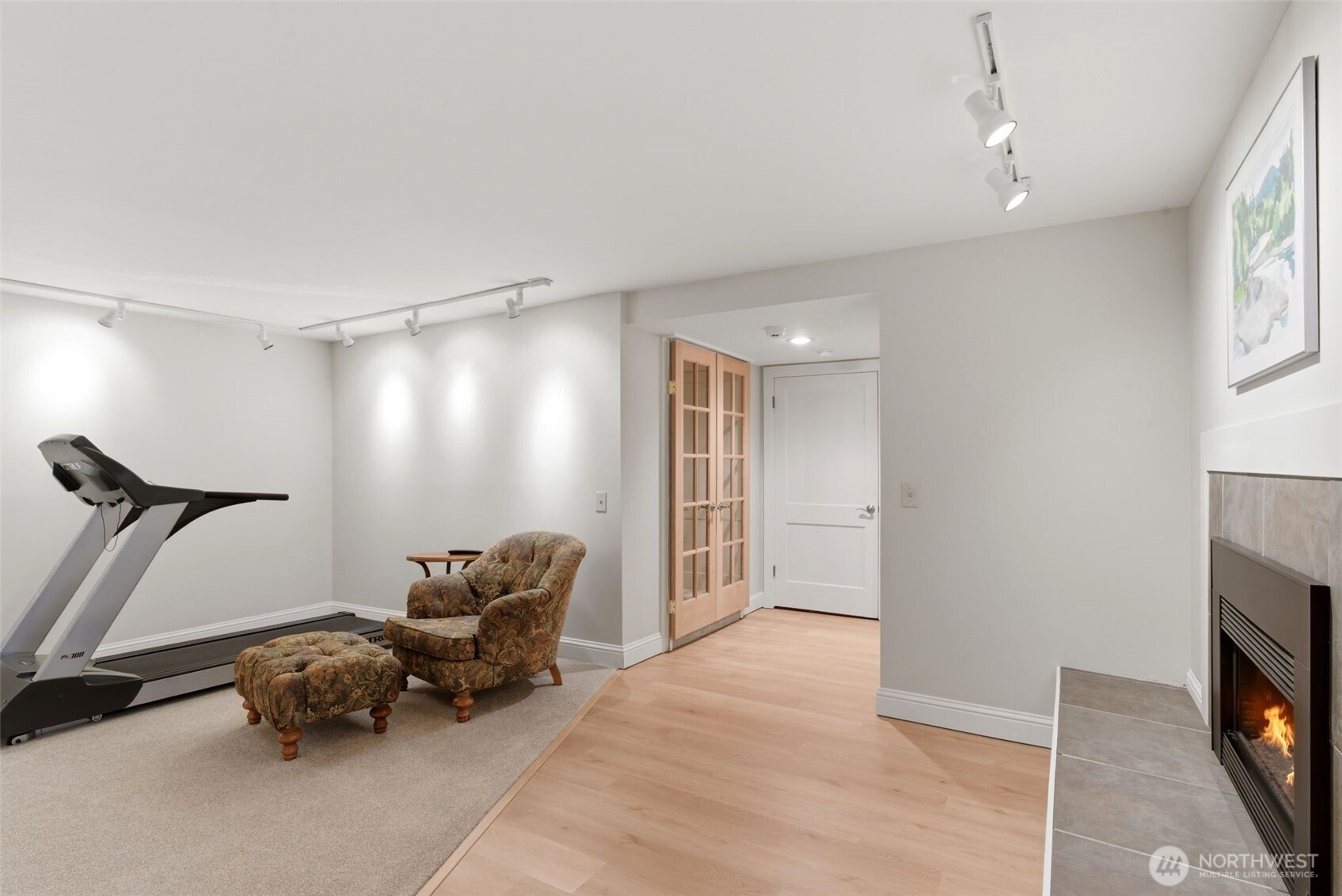 Lower level living room with fireplace.