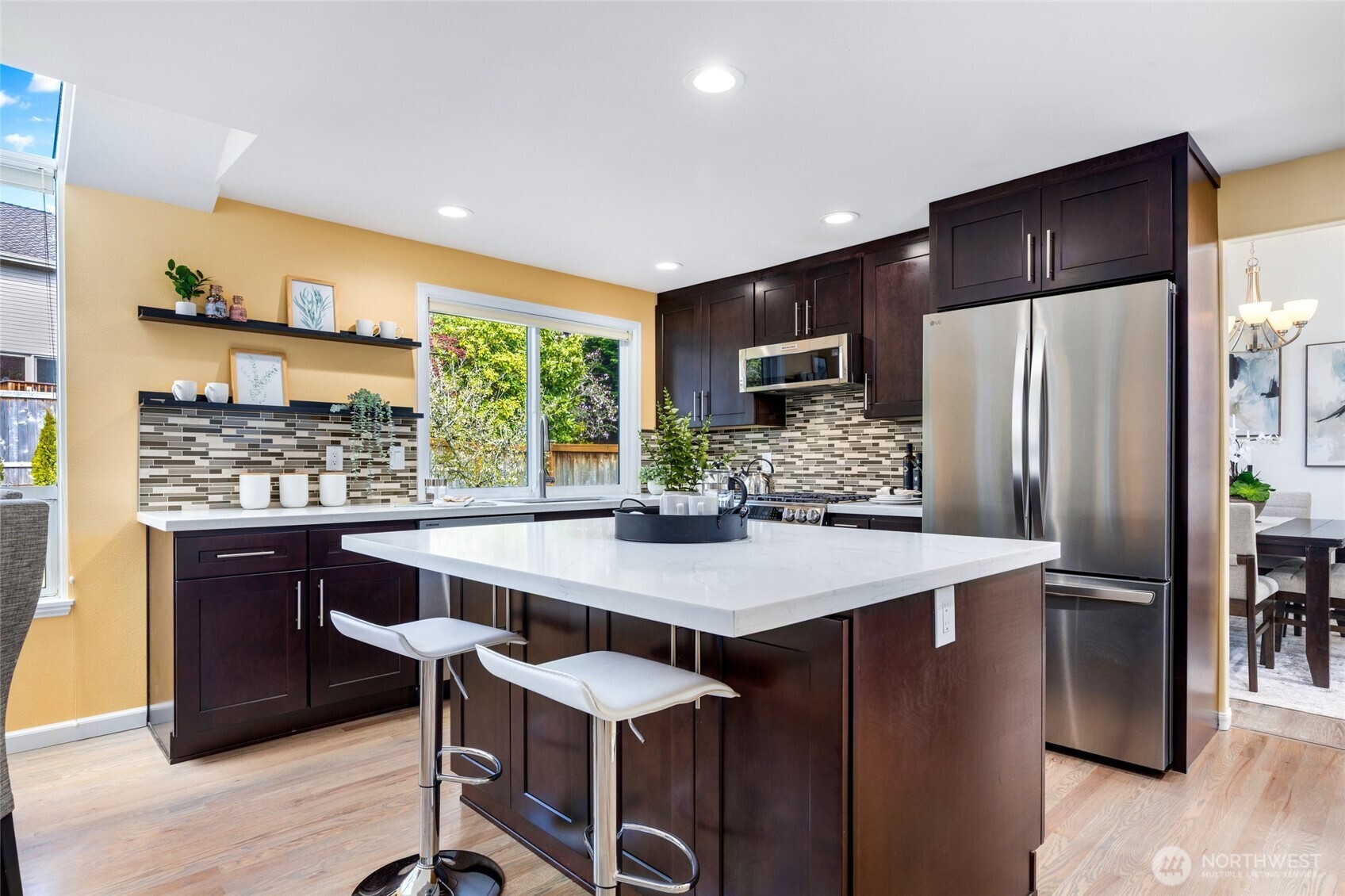 Quartz counters and cabinet drawers with easy-close compression