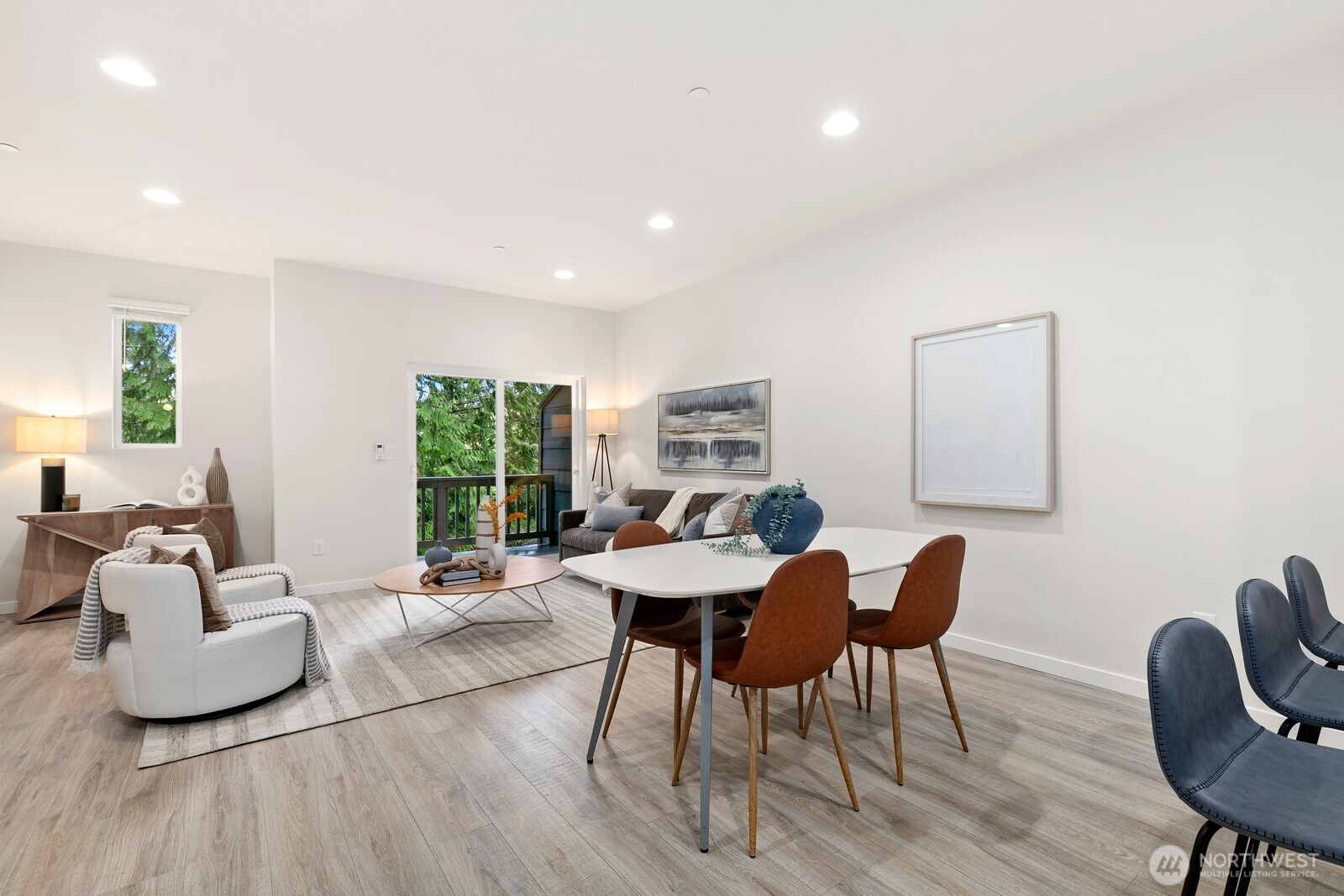 Vinyl flooring runs throughout property with exception of bedrooms, which all feature brand new carpet!