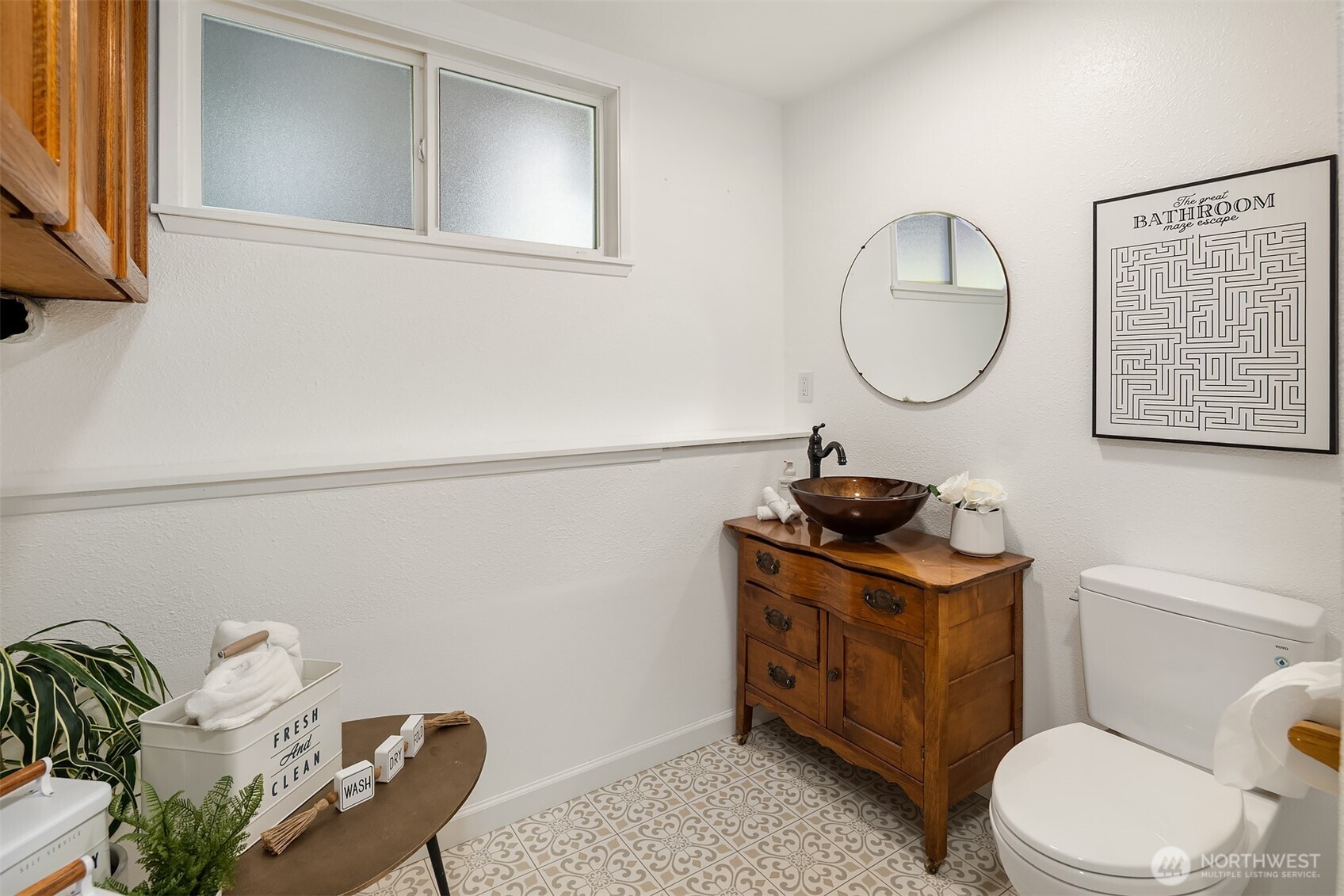 Lower level utility room with half bath
