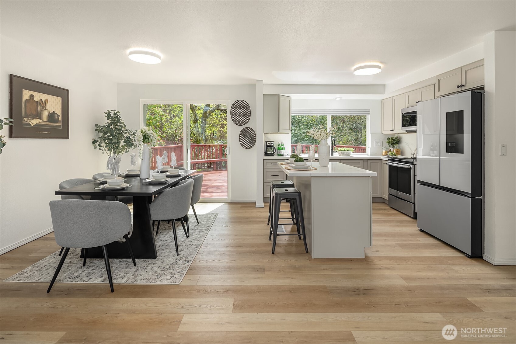 Brand new cabinets, quarts counters & slab backsplash make this kitchen clean and modern