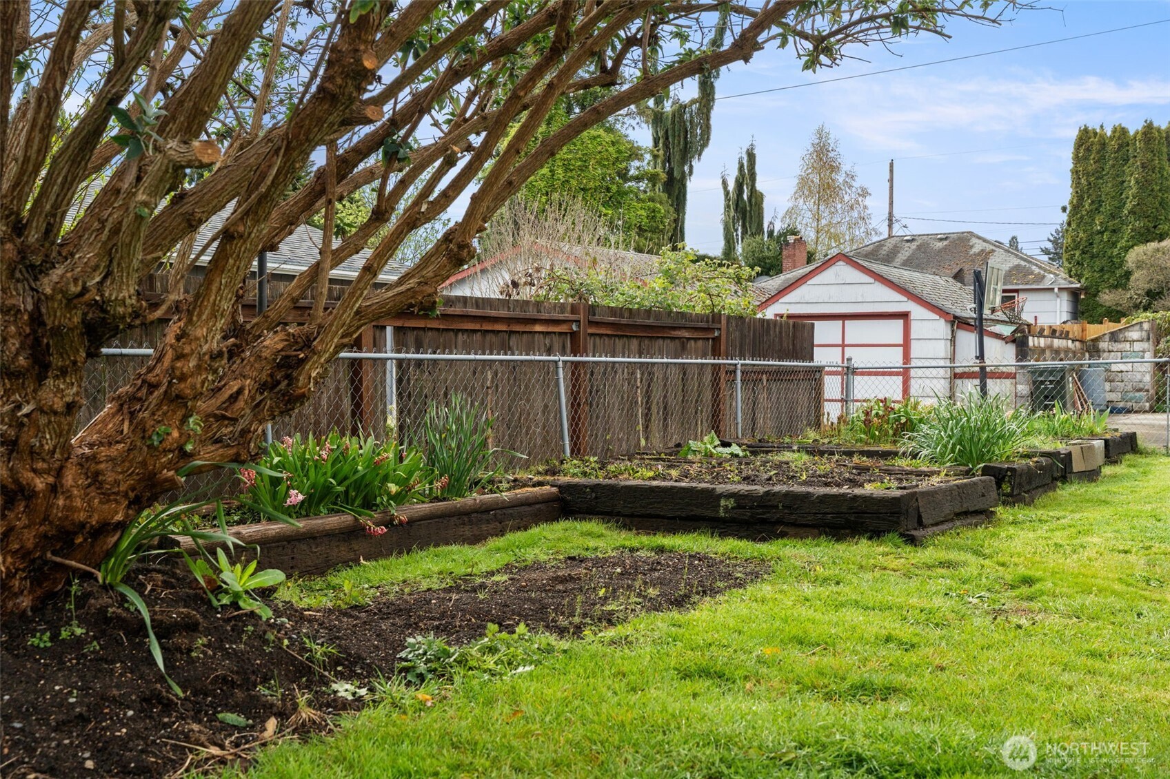 Level yard with garden space.