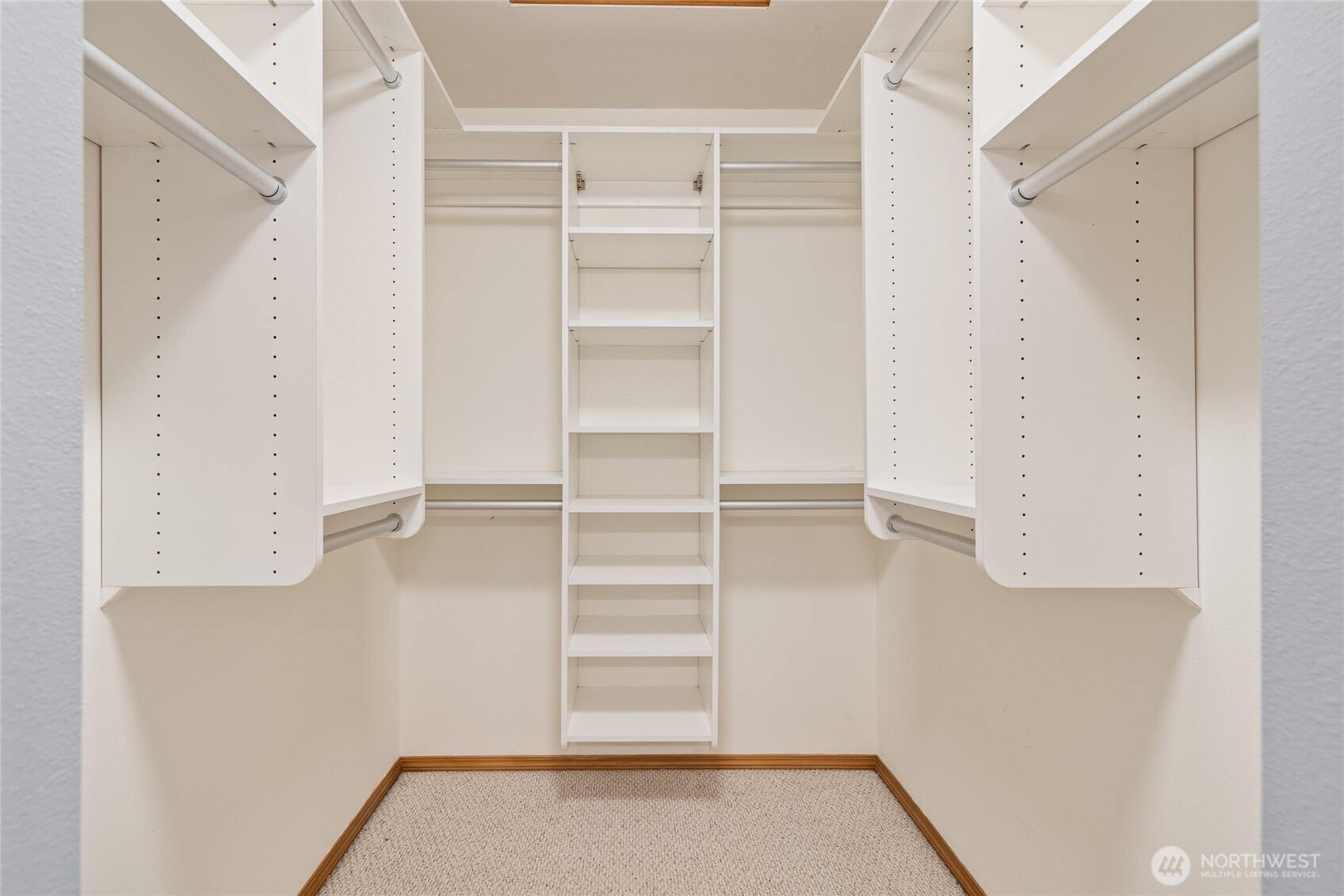 Custom California Closets enhance both the pantry and primary suite. The primary bath features a six-foot soaking tub and a cable TV hookup.