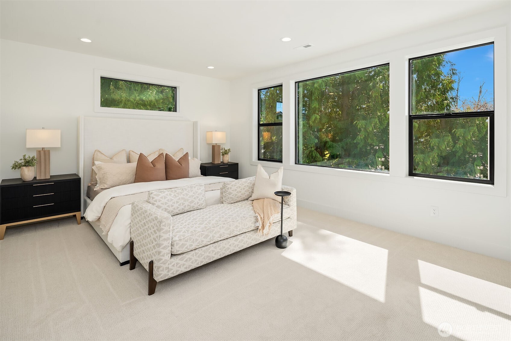 Designer primary suite with five-piece bath & heated floors