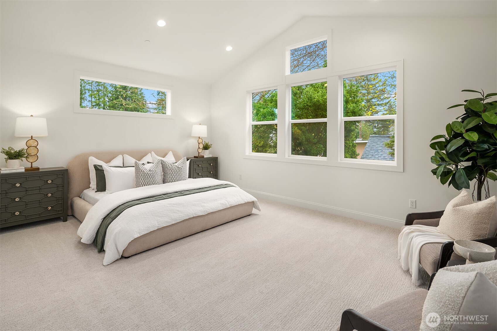 Designer primary suite with five-piece bath with heated floors