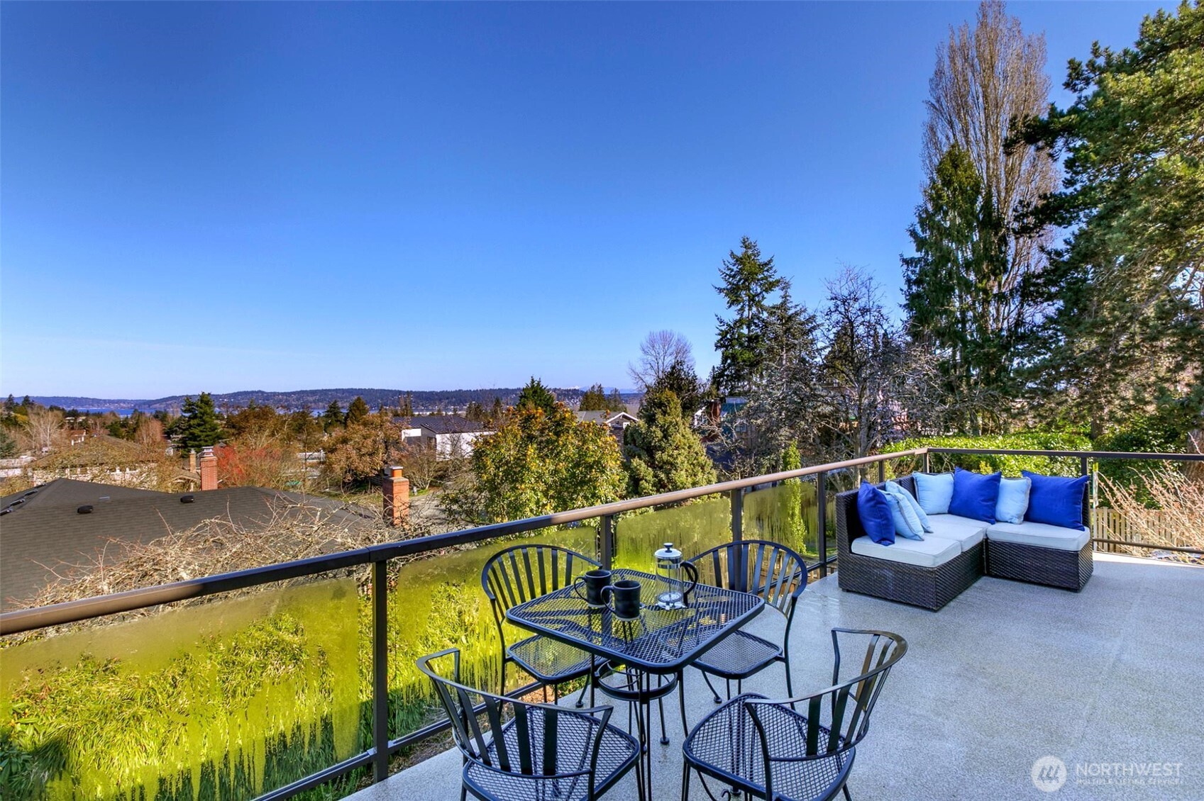 View deck off family room offers views of mountains and Lake Washington.