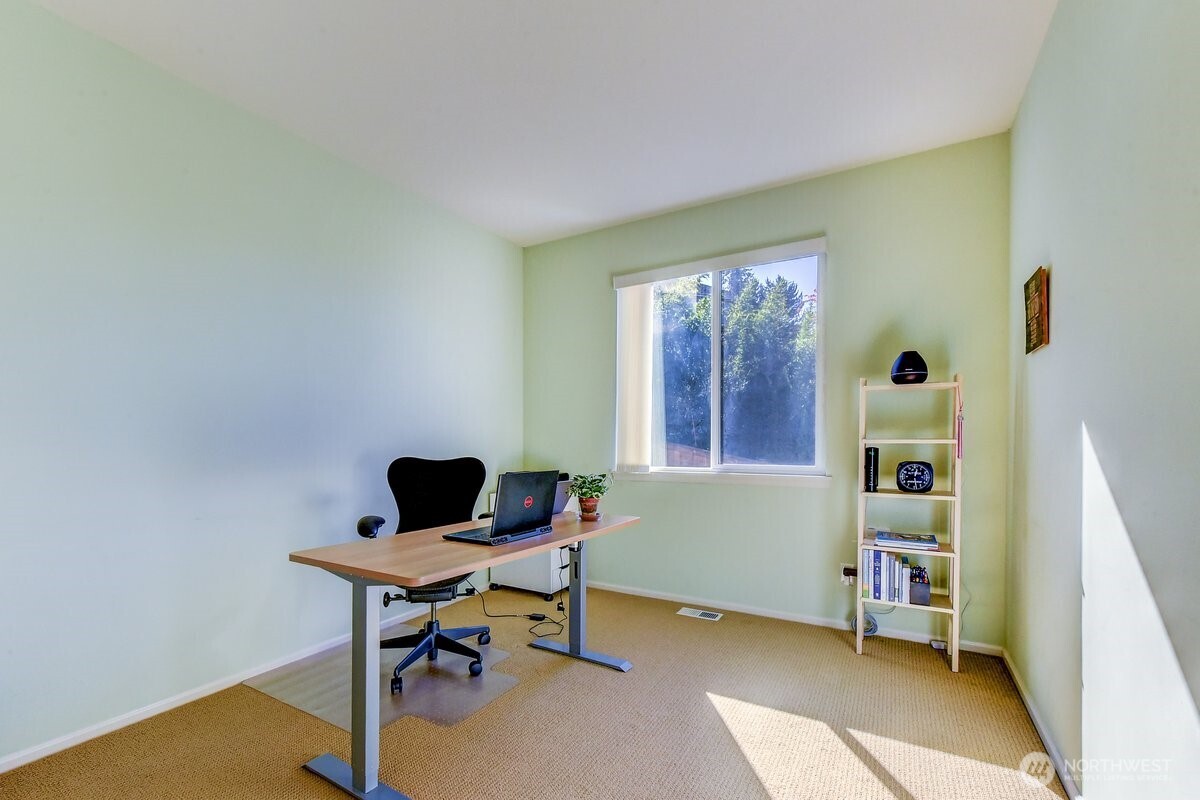 Awesome bonus/5th bedroom offers great entertainment space and stunning mountain views on nice days.