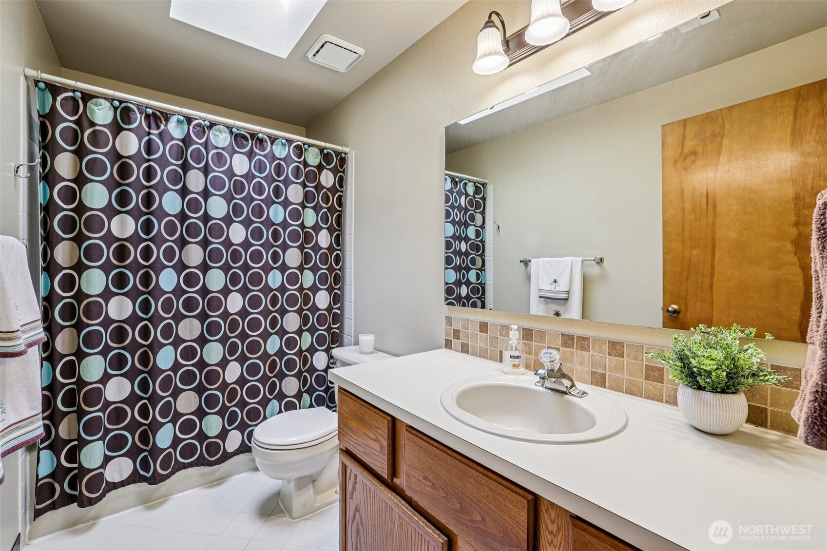 Conveniently located main bath