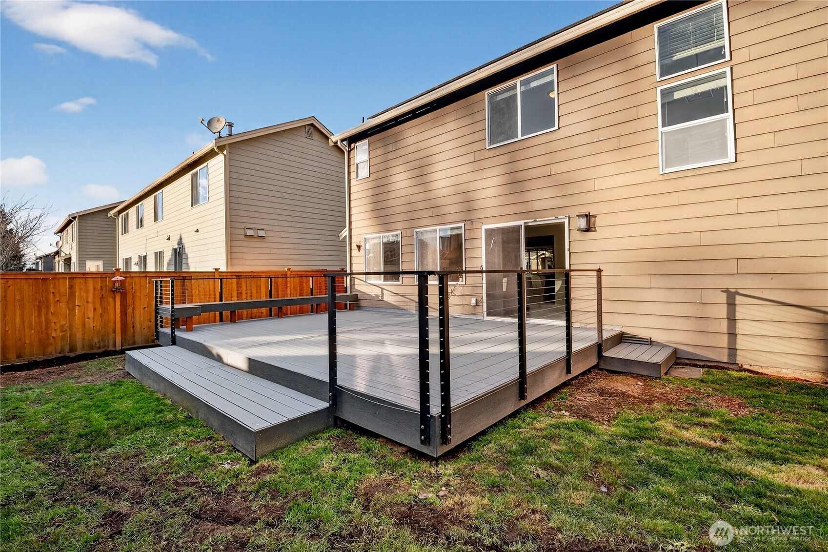 New Deck has Modern Railing & Built-In Bench