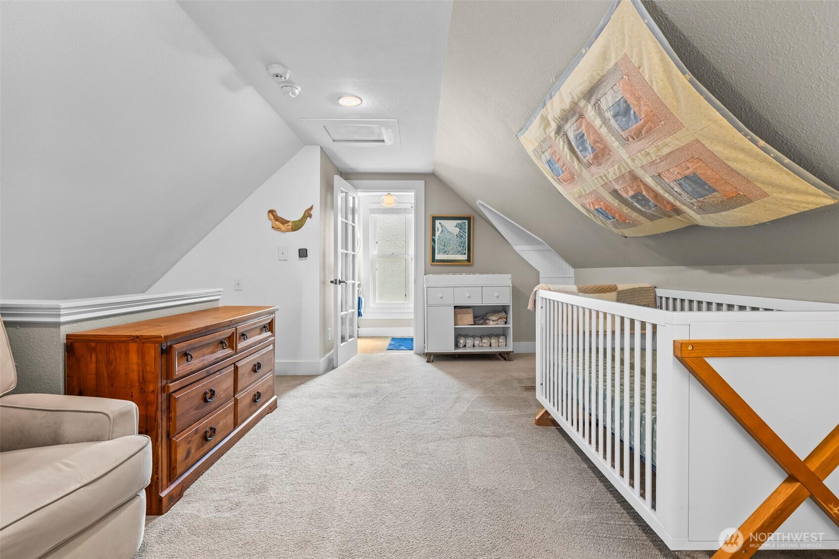 large sitting area outside of primary suite