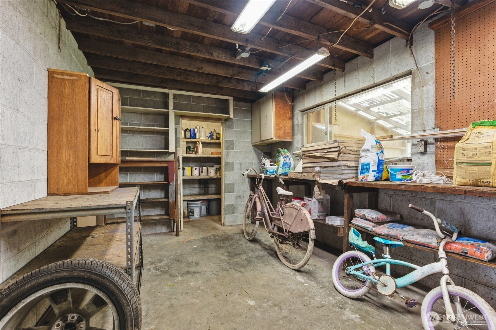 This oversized carport has a lot of room for various projects!