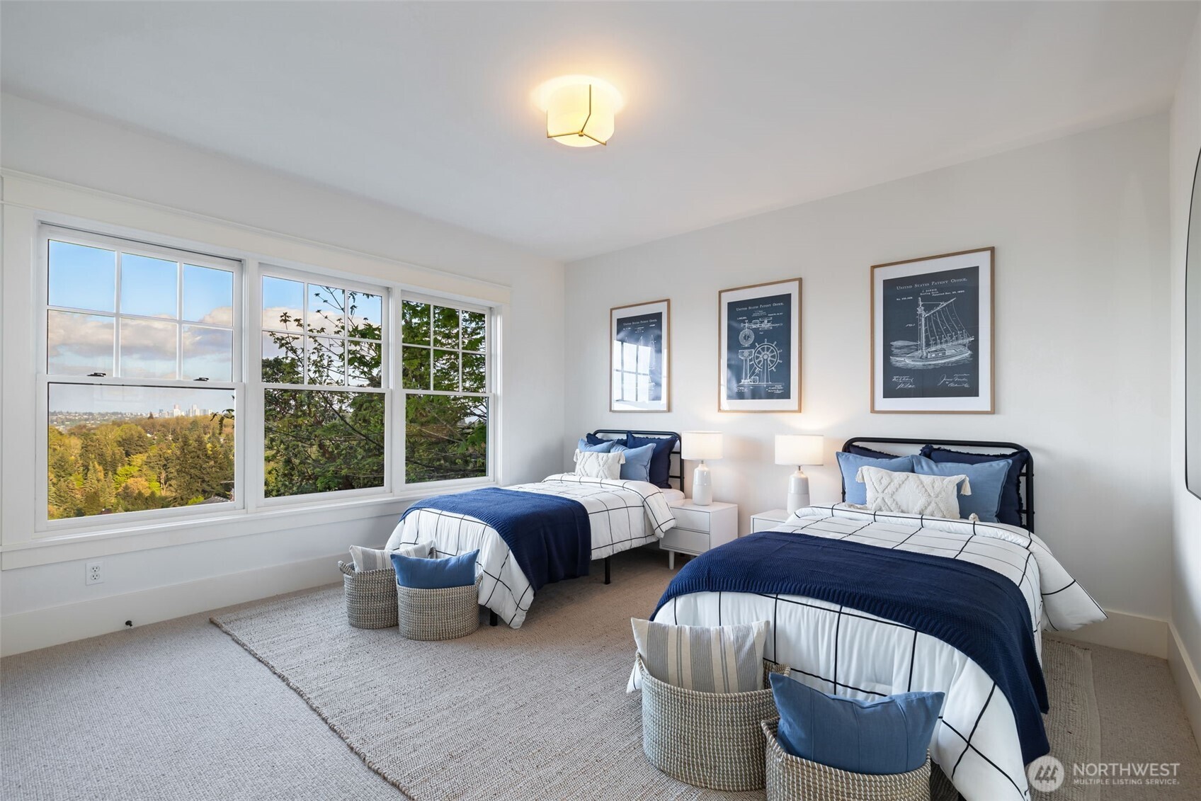 Informal living below the kitchen with terrace access and a gas fireplace.