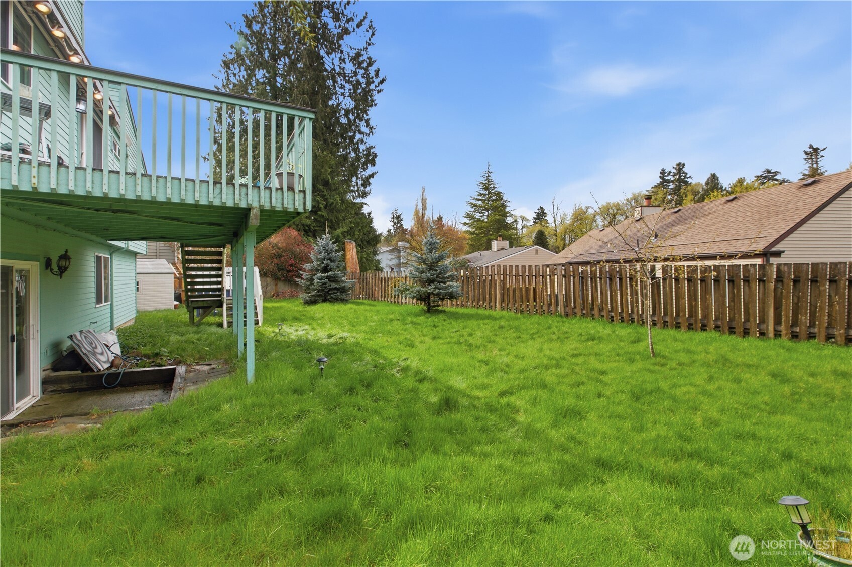 Lage fenced in backyard