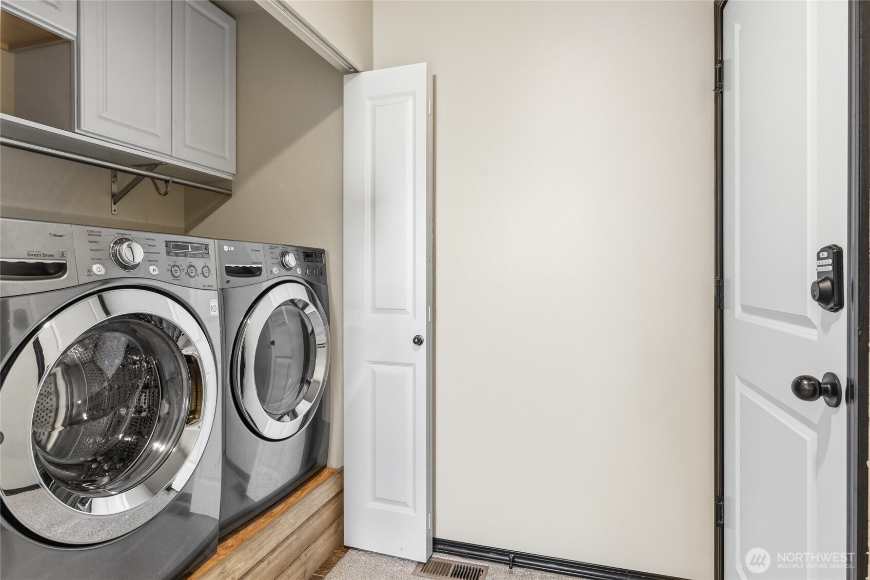 laundry. washer and dryer convey. garage to the right.