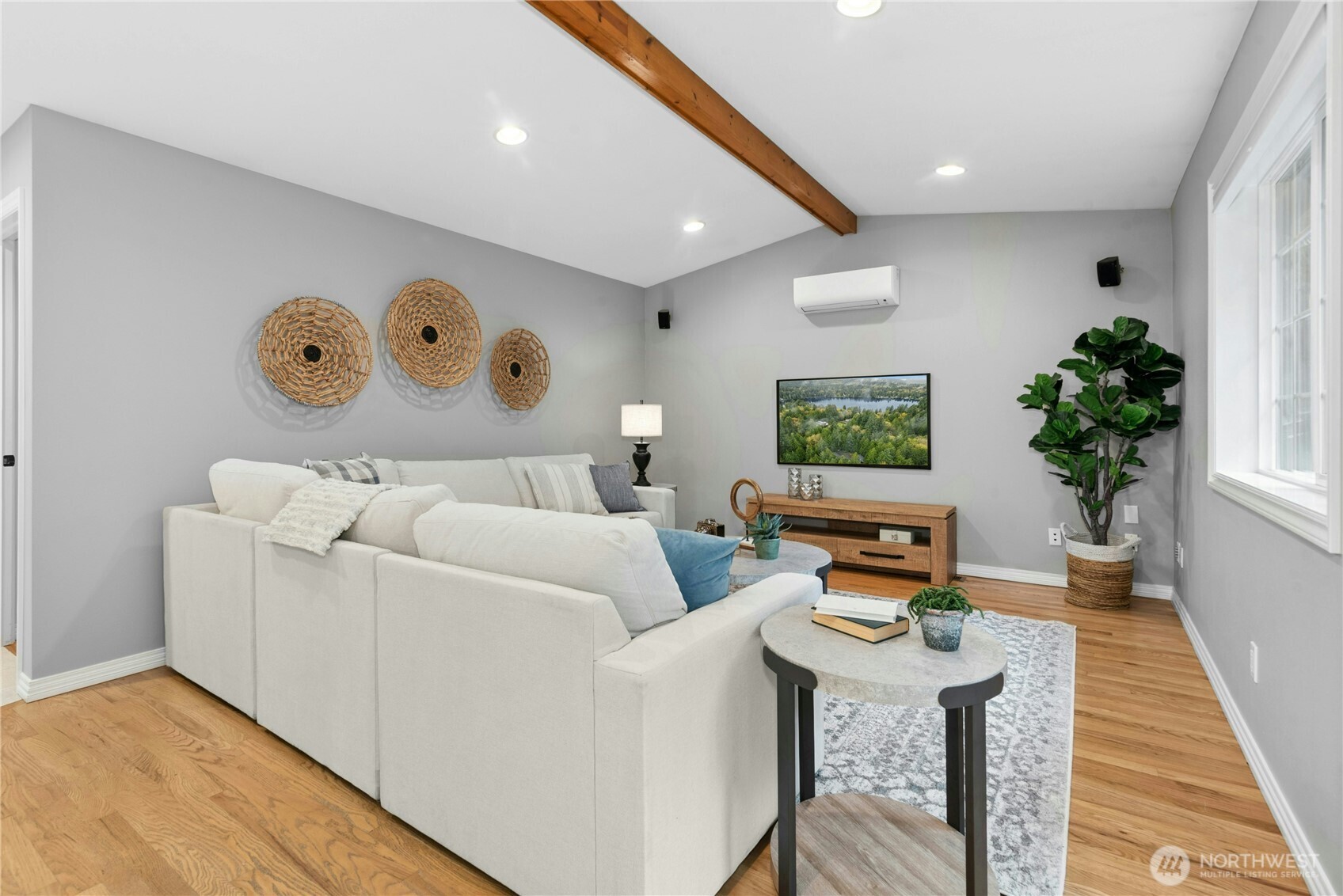 Through the French doors you have real hardwood floors, vaulted ceilings, mini-splits for year round comfort!