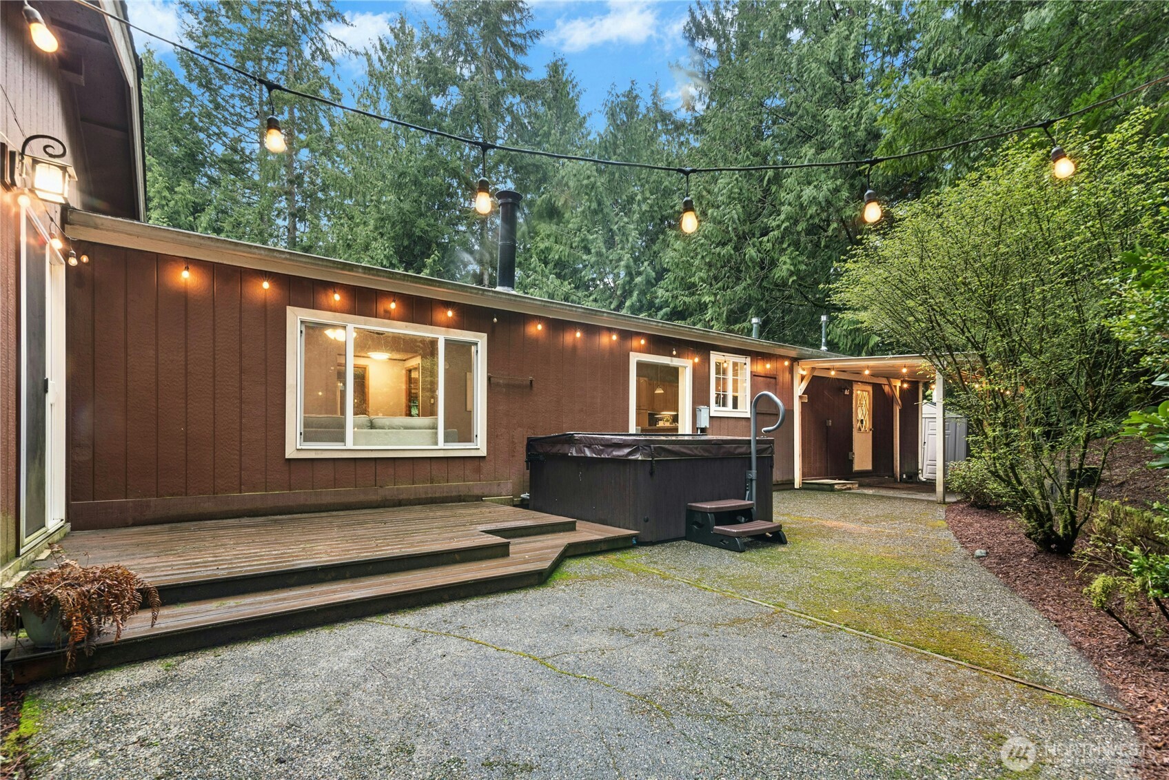 Backyard fun with hot tub, covered patio and deck!
