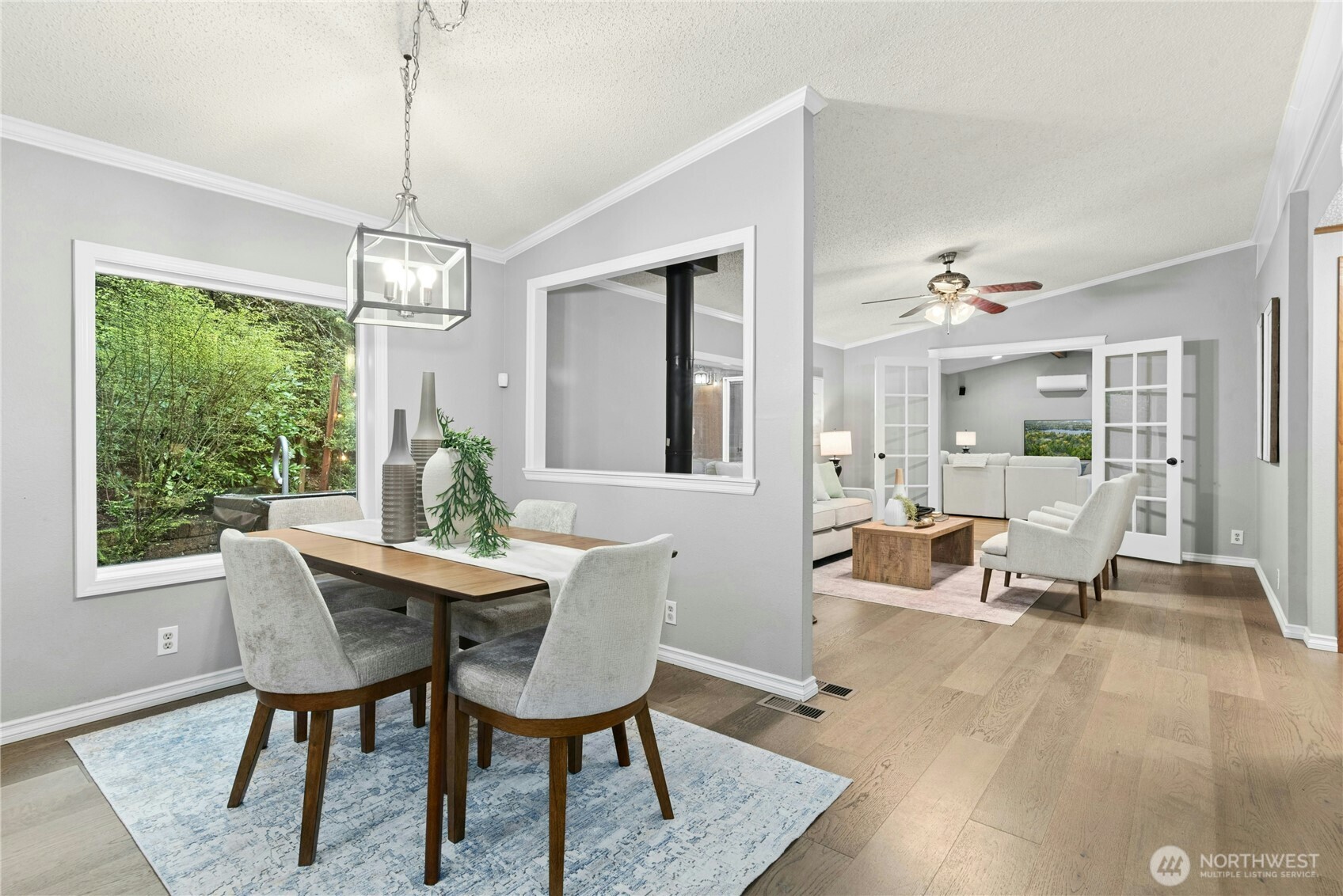 Kitchen opens to dining and sitting room.