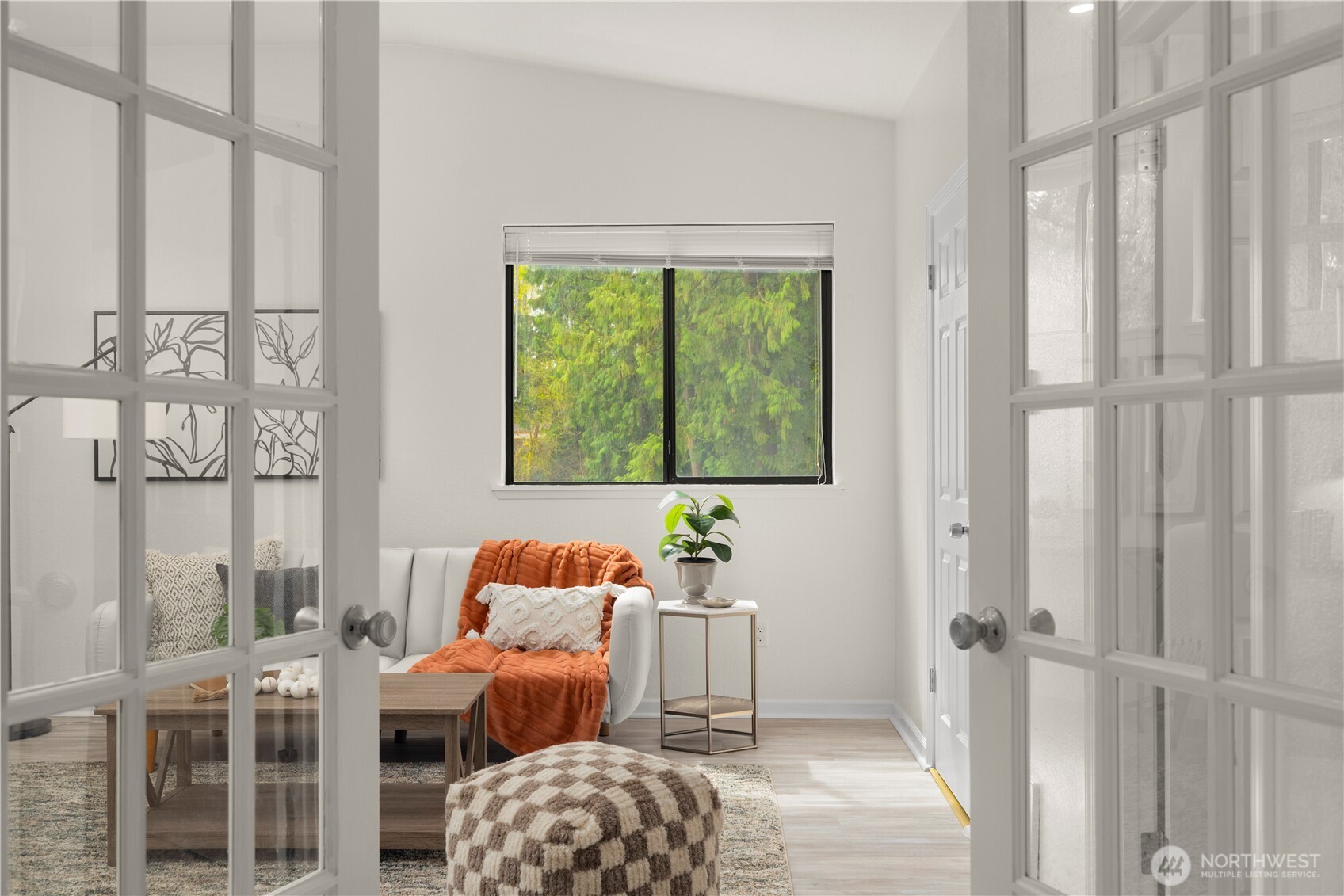 Upstairs bonus room with french doors. Could easily be used as a guest bedroom with full closet and attached bathroom.